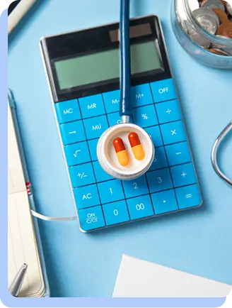 A blue calculator with a stethoscope and a small container of orange and white capsules.