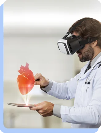 A male scientist wearing a VR headset and a lab coat, interacting with a glowing 3D holographic projection of a human heart.