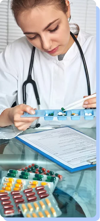 A medical professional in a white coat looking down while organizing various pills and capsules into a blue daily medication planner on a desk.